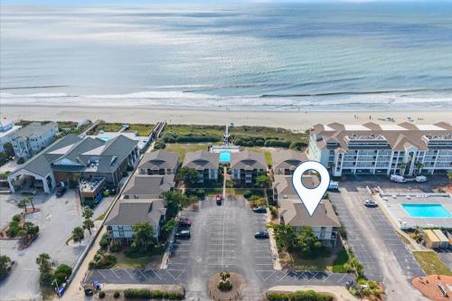 an aerial view of a resort near the beach at Castle By The Sea Beach Front Condo in Ocean Isle Beach