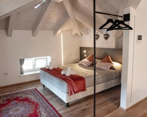 a bedroom with a bed in a room at Da Franca in Riva del Garda