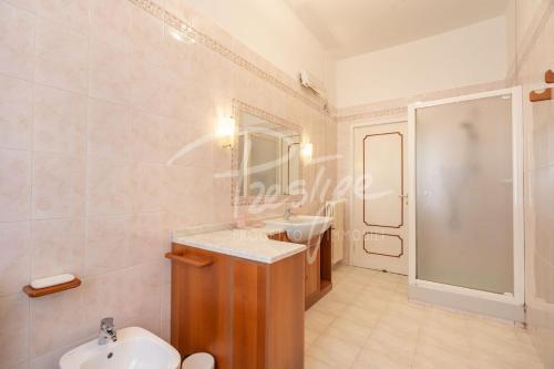 a bathroom with a sink and a shower at Villa Elena in Portovenere