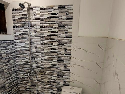 Vonios kambarys apgyvendinimo įstaigoje UrbanNook