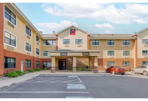 a hotel with a parking lot in front of it at Studio 6 Extended Stay Washington - DC Germantown MD in Germantown