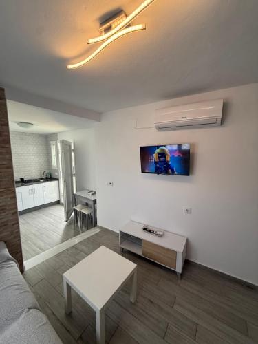 estudio con terraza