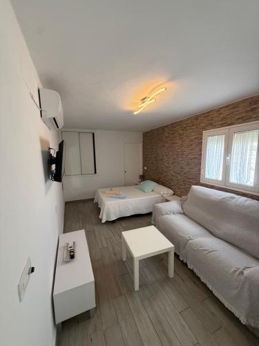 estudio con terraza