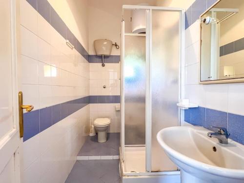 a bathroom with a sink and a toilet at Antico Casale Ventotene in Ventotene