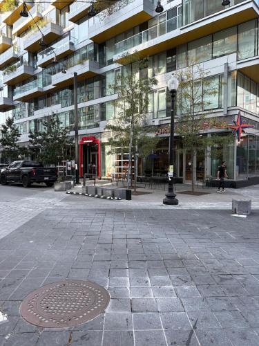 a large building with a street light in front of it at Downtown house w On-site Parking Walk to Capital, Museums B in Washington, D.C.