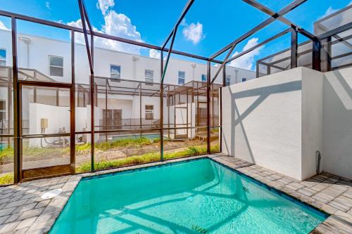 Two-story, dog-friendly townhouse with a lanai, private pool, & washer/dryer photo 37