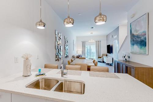 Two-story, dog-friendly townhouse with a lanai, private pool, & washer/dryer photo 7