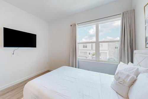 Two-story, dog-friendly townhouse with a lanai, private pool, & washer/dryer photo 22