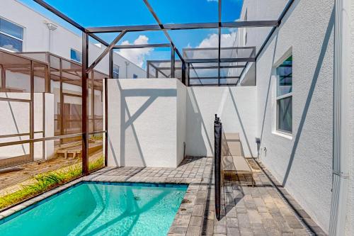 Two-story, dog-friendly townhouse with a lanai, private pool, & washer/dryer photo 39