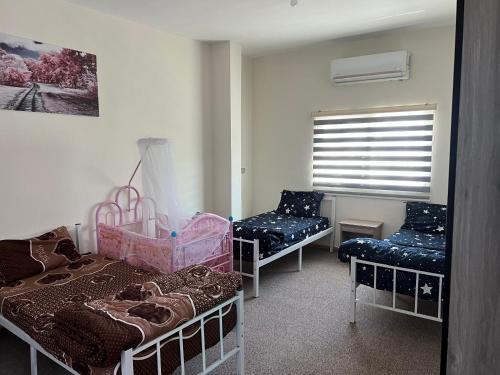 Llit o llits en una habitació de Altamem apartment