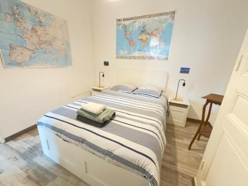 Le Balcon du Centre tesisinde bir odada yatak veya yataklar
