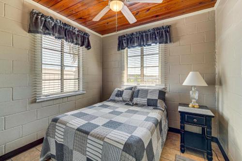 a bedroom with a bed and a ceiling fan at Lake View, Pool Access! Pet-Friendly Hernando Stay in Hernando