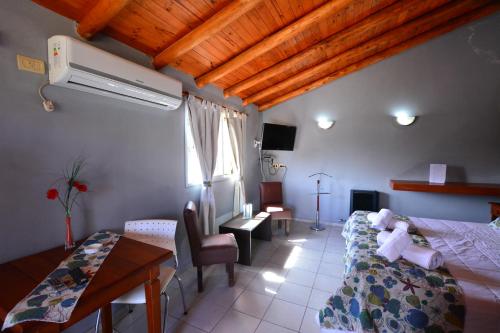 Postel nebo postele na pokoji v ubytování Altos de Aliwen