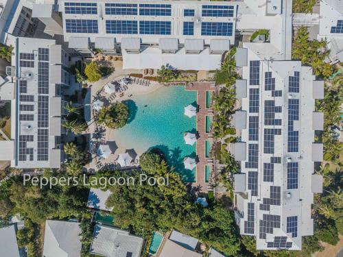 an aerial view of the pool at peepers lagoon pool apartments at Salt Beach Resort Apartments by Kingscliff Accommodation in Kingscliff