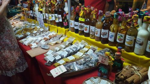 a display of bottles of wine on a table at Beau studio au coeur du Gosier in Le Gosier