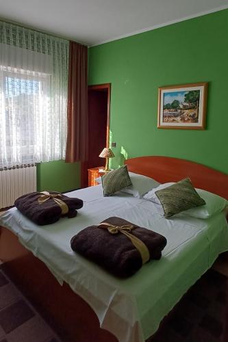 Apartments by the sea Palit, Rab - 22493