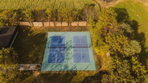an overhead view of a swimming pool in the grass at Brij Bageecha, Jaipur - IHCL SeleQtions in Jaipur