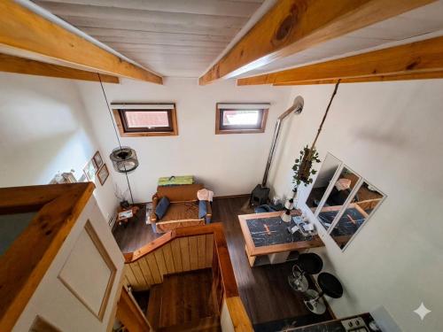 an overhead view of a room with a living room at Casa Arrayan in Coñaripe