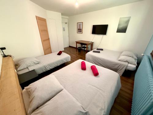 Postel nebo postele na pokoji v ubytování Auberge de la Source