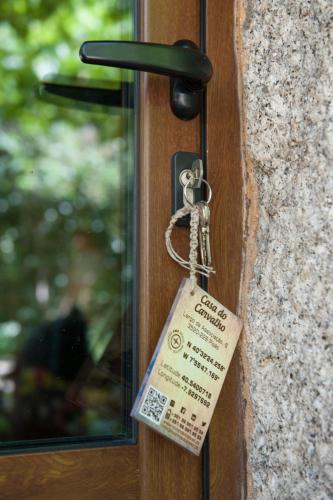 a key chain is attached to a door at Moinhos do Pisão in Povoa Dao