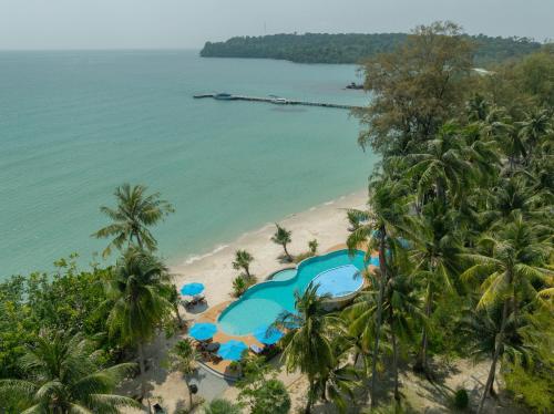 an aerial view of a beach with a swimming pool at Mafiya Resort in Koh Rong Island