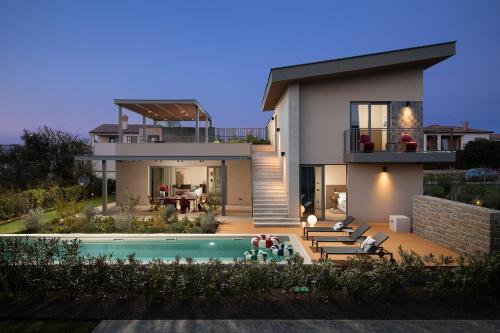Villa Puerto de Luz with a panoramic sea view and private mini golf