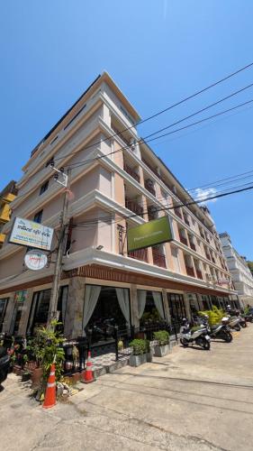 a large building on the corner of a street at Diamond Crown Patong in Patong Beach