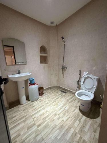 a bathroom with a toilet and a sink at House with beautiful partial sea view in Mirleft