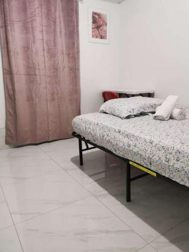 a bedroom with a bed in a room at 586 Hotel in Toronto