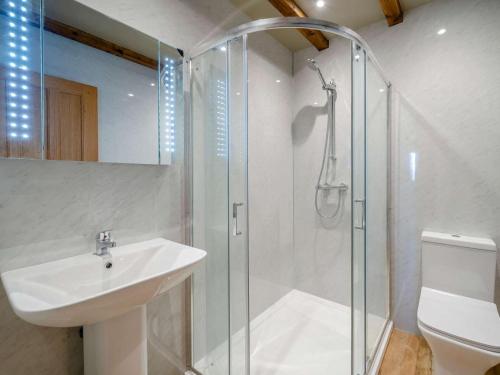 a bathroom with a shower and a sink and a toilet at 2 Bed in Lancaster oc-53510 in Beetham