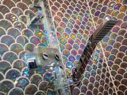 a room with a wall of colorful glass plates at 1 Bed in Richmond oc-82829 in Gilling