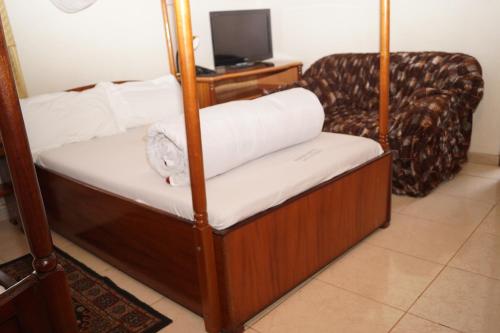 Cama o camas de una habitación en Vision Hotel Kampala
