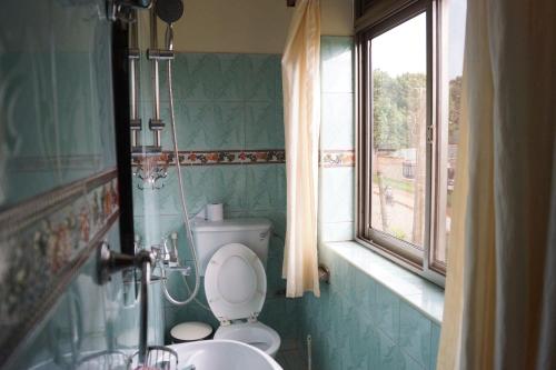 Un baño de Vision Hotel Kampala