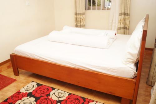 Cama o camas de una habitación en Vision Hotel Kampala