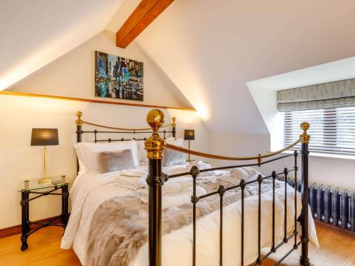 a bedroom with a bed and a window at 1 Bed in Frome oc-83834 in Holwell