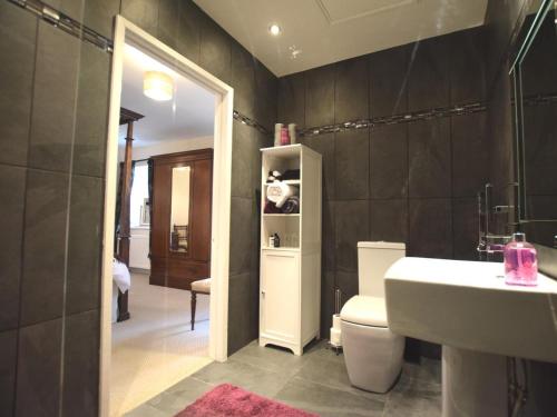 a bathroom with a white toilet and a sink at 1 Bed in Newcastle Upon Tyne oc-49414 in Rochester