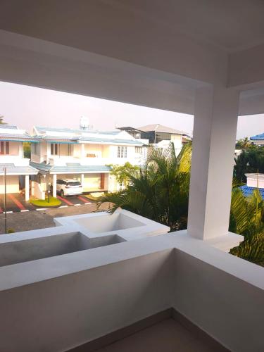 a view from the balcony of a house at HK villas in Edappally