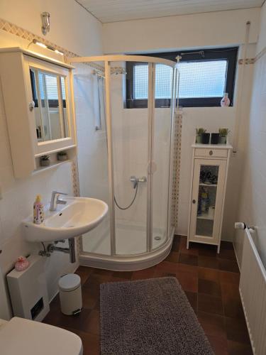 a bathroom with a shower and a sink at Fewo Lieblingsblick, gemütlich & chic in Bad Münstereifel