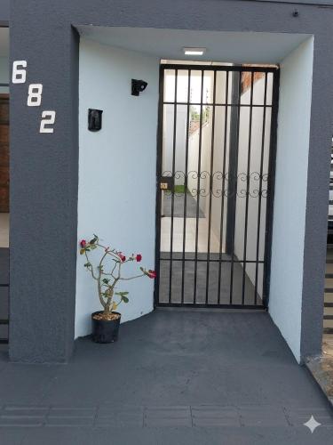 a door with a potted plant in front of a building at 3 A A a in Sinop