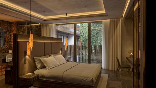 a bedroom with a bed and a balcony at The Bank by MYR Hotels in Valencia