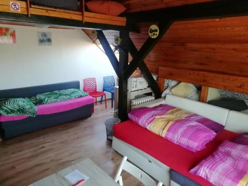 Vuode tai vuoteita majoituspaikassa Suite Ohrada