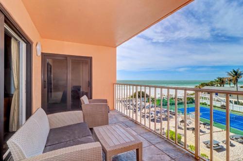 a balcony with a view of the ocean at Reef Club 304 in Clearwater Beach