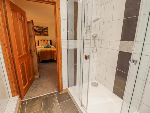 a bathroom with a shower and a walk in showeroser at Old Riggs Paddock in Penrith