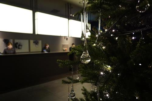 a christmas tree with ornaments on top of it at Shilla Stay Gangnam Yeoksam in Seoul