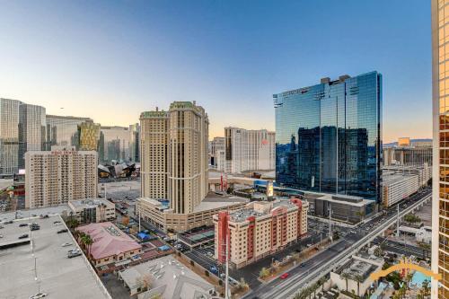 an aerial view of a city with tall buildings at MGM Signature-22-615 Strip View Balcony Studio in Las Vegas