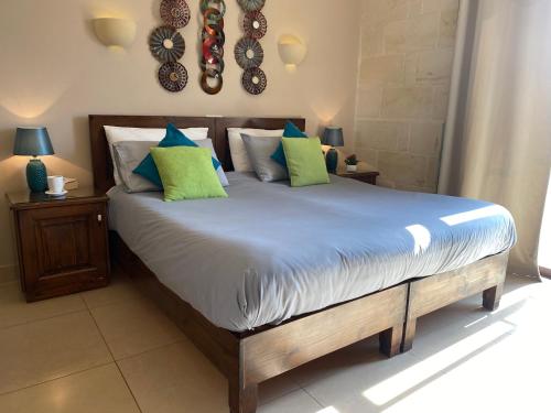 Llit o llits en una habitació de Ta’ Giljan B&B Gozo