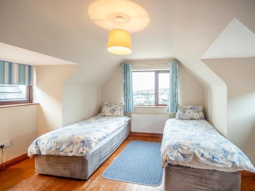 a bedroom with two beds and a window at 3 Bed in Dingle oc-ii05995 in Dingle