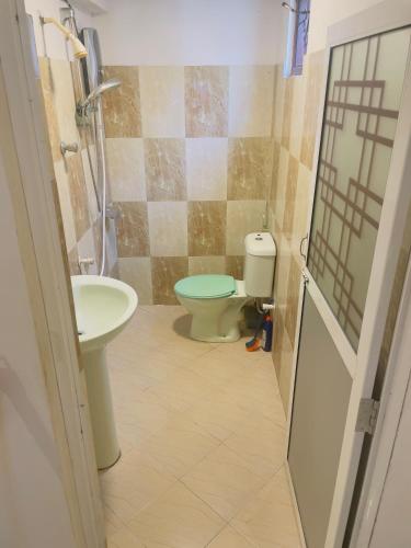 Vonios kambarys apgyvendinimo įstaigoje Chrish Residence