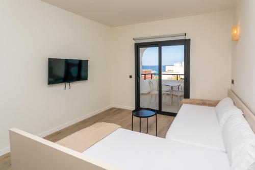 Foto Apartamentos San Antonio Beach 2