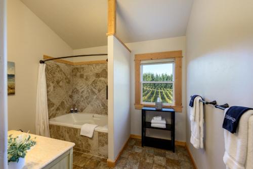 a bathroom with a bath tub and a sink at Franziska Haus in Dundee